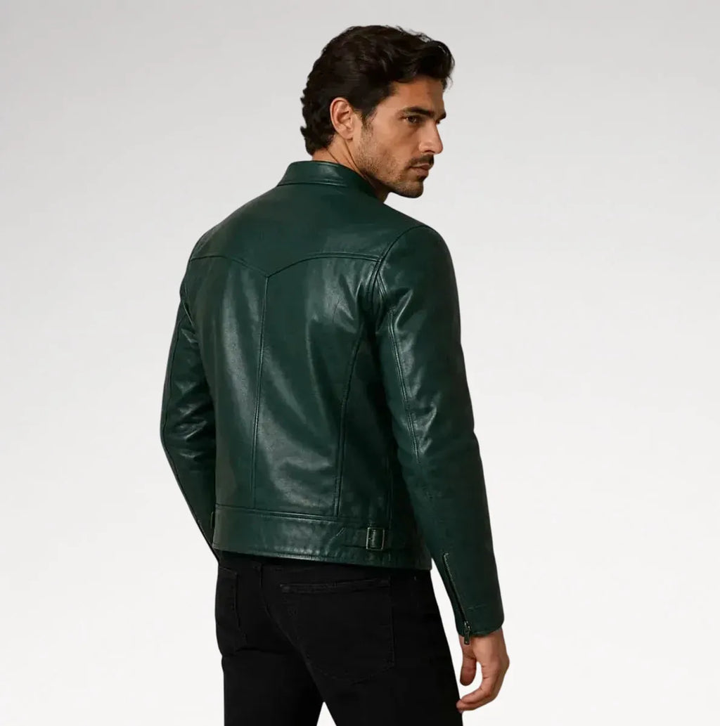 A man wearing a dark green leather jacket, shown from a three-quarters back view against a light gray studio background.