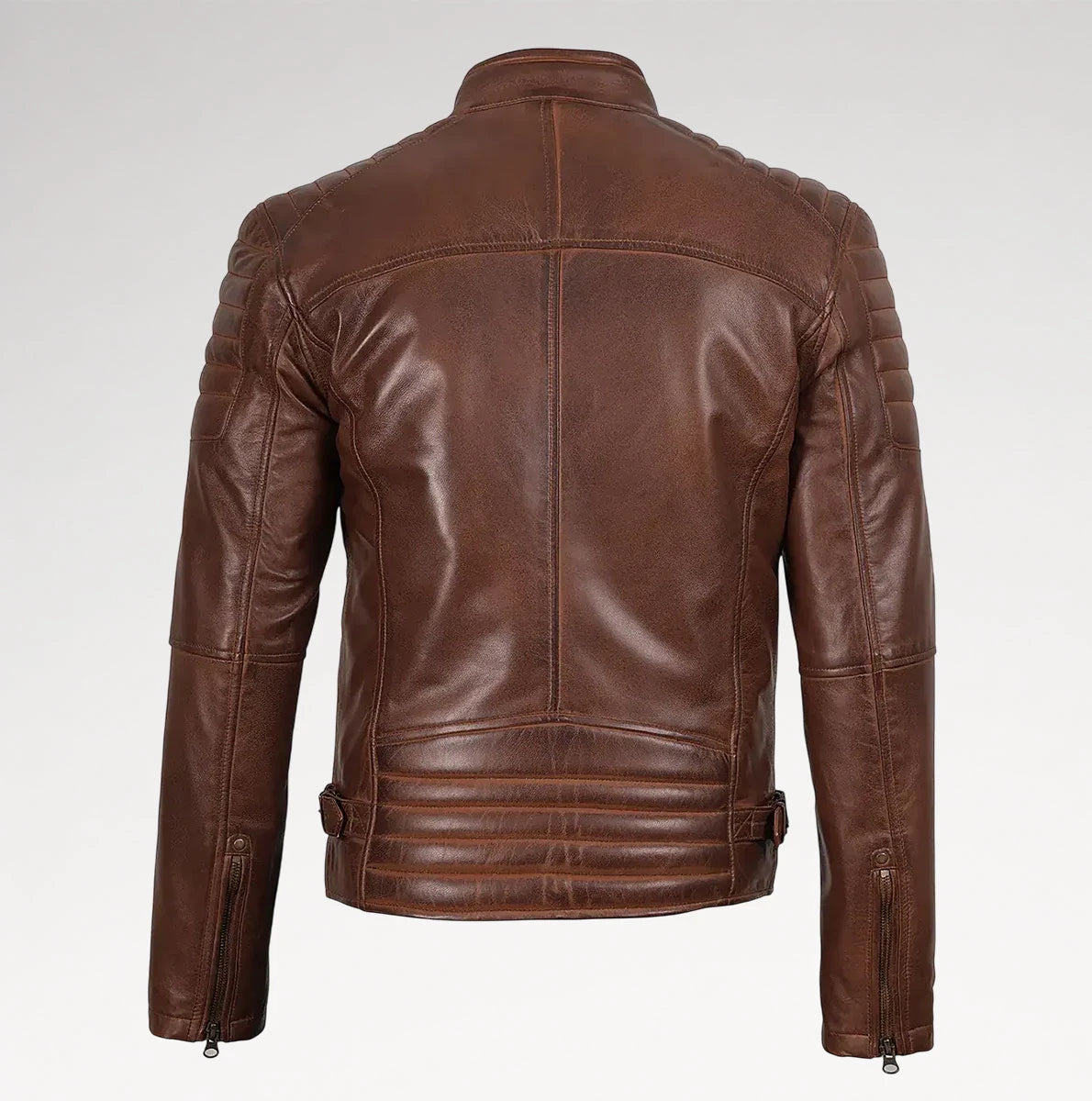 A brown leather motorcycle jacket shown from the back, featuring quilted shoulder panels, a high collar, and zippered side pockets, photographed against a light gray studio background.