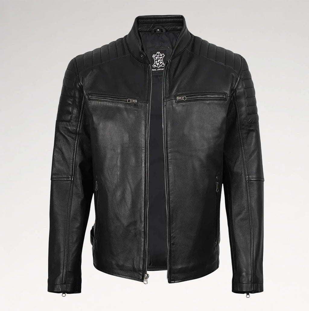 A black leather motorcycle jacket with quilted shoulder panels, a stand collar, and zippered chest pockets, shown against a light gray background.