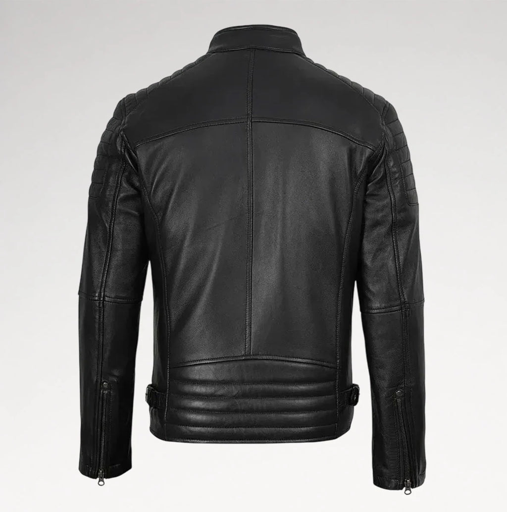 Black leather motorcycle jacket shown from the back, featuring quilted shoulder panels, a high collar, and zippered side details, photographed against a light gray studio background.