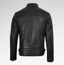 Black leather motorcycle jacket shown from the back, featuring quilted shoulder panels, a high collar, and zippered side details, photographed against a light gray studio background.
