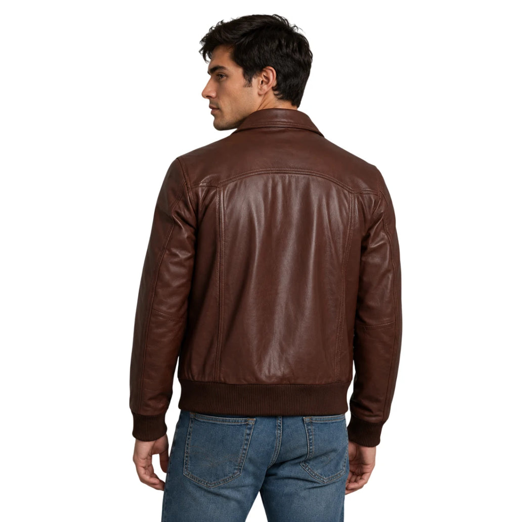 A man wearing a brown leather jacket, shown from the back, paired with blue jeans against a plain white background.
