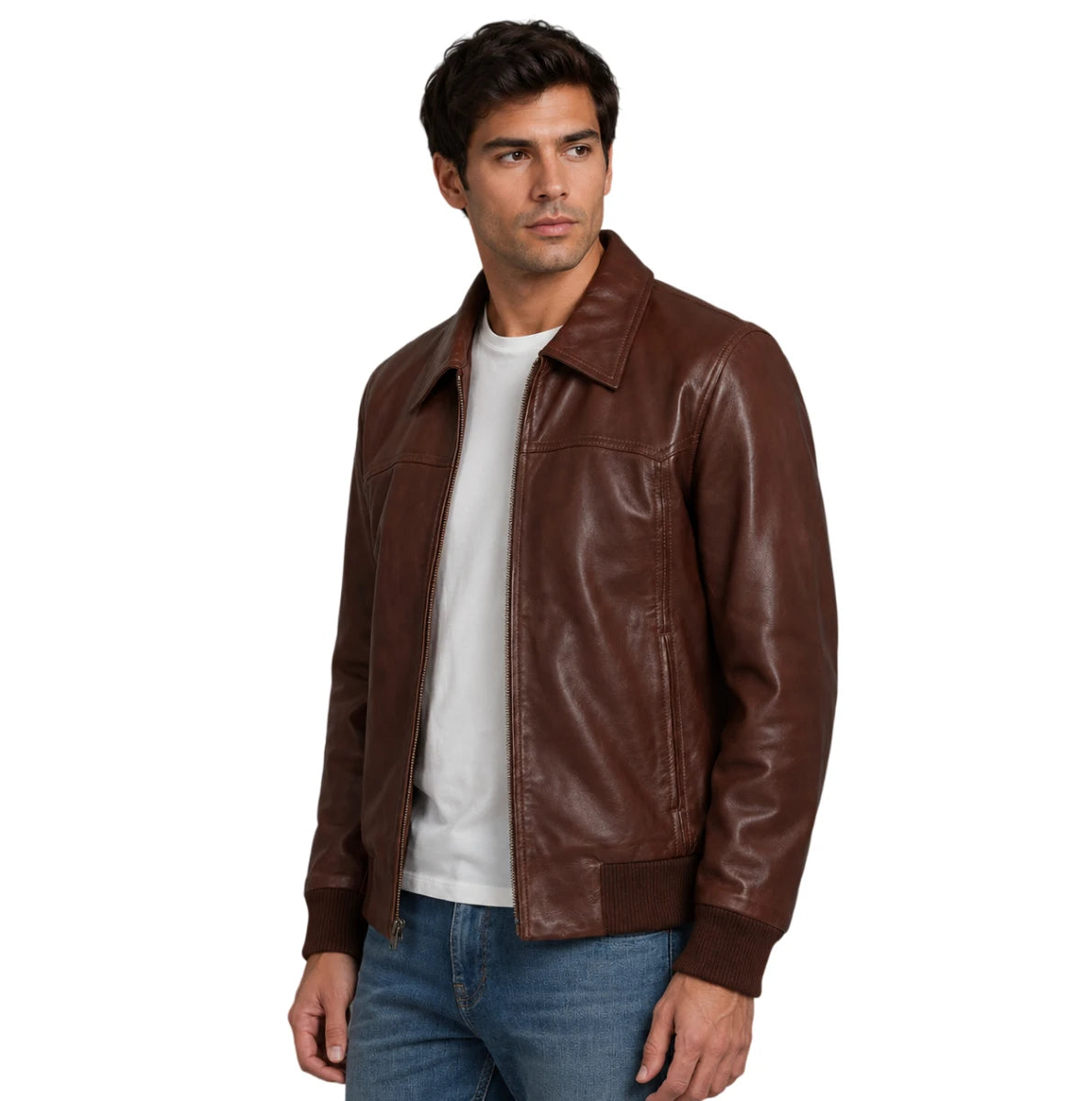 A man wearing a brown leather jacket over a white t-shirt and blue jeans, photographed against a solid white background.