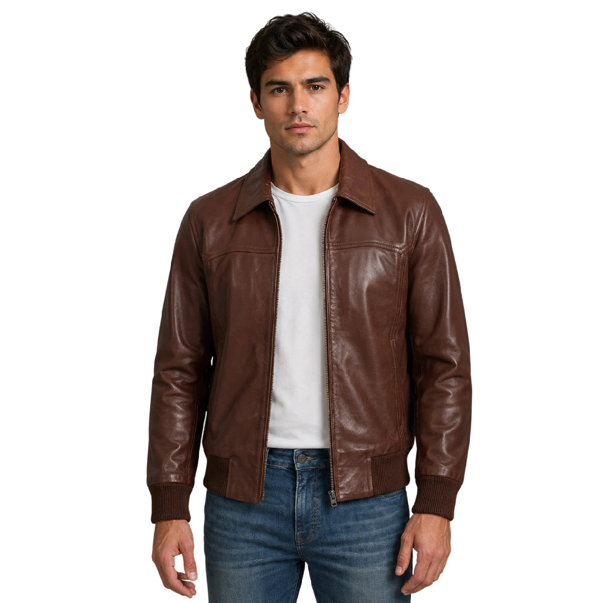 A man wearing a brown leather jacket over a white t-shirt and blue jeans, standing against a plain white background.