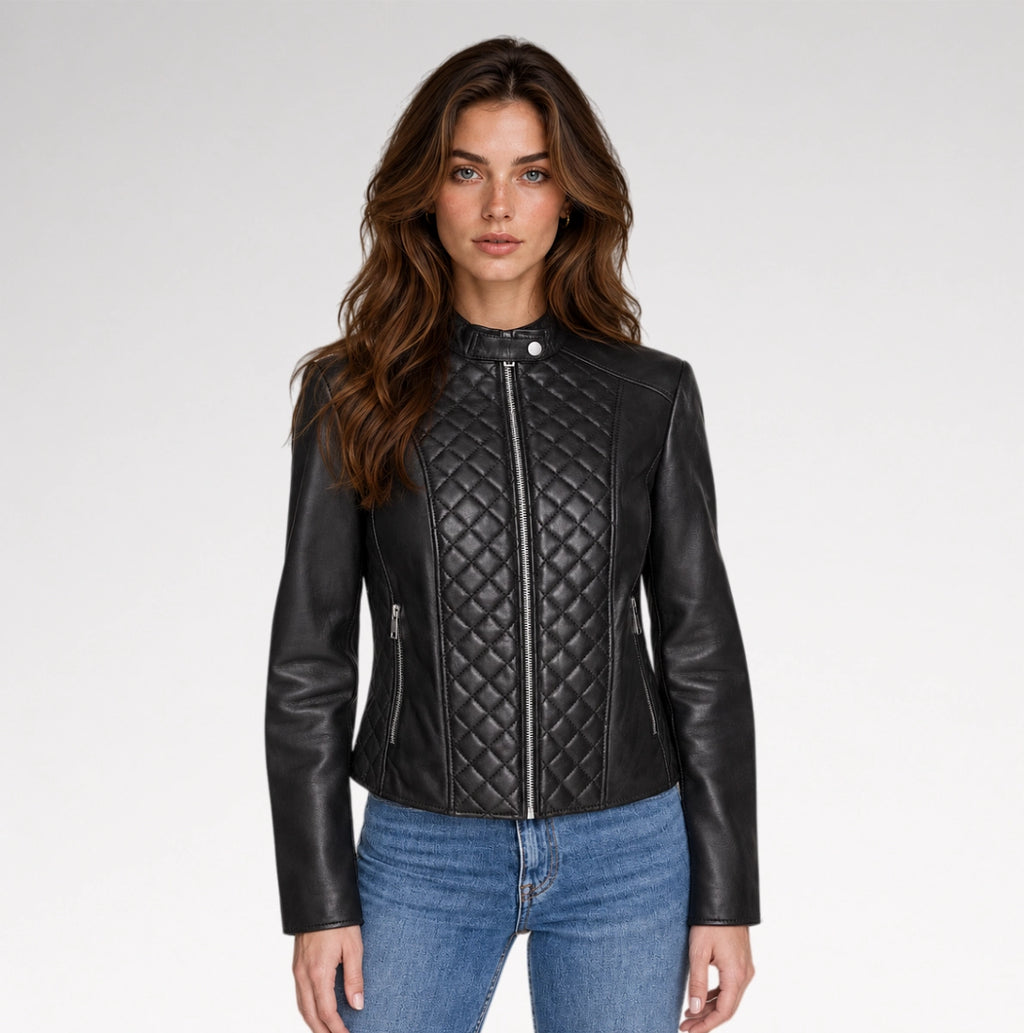 A model is wearing quilted leather jacket with cafe racer style in grey background