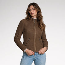 A woman is wearing dark brown suede leather jacket.