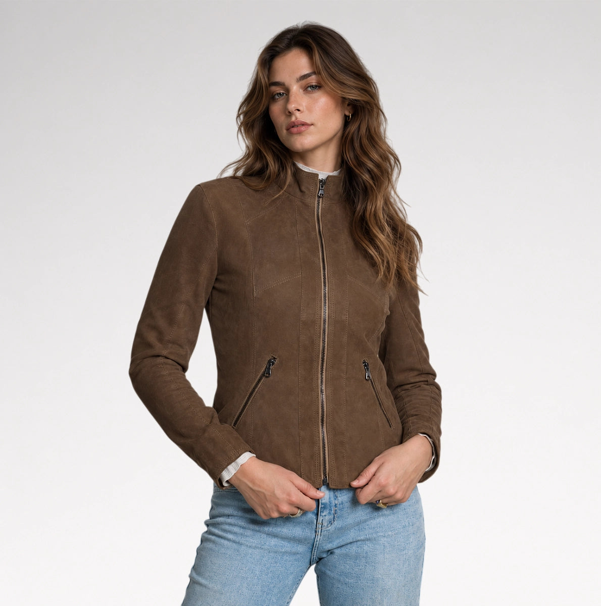 A woman is wearing dark brown suede leather jacket.