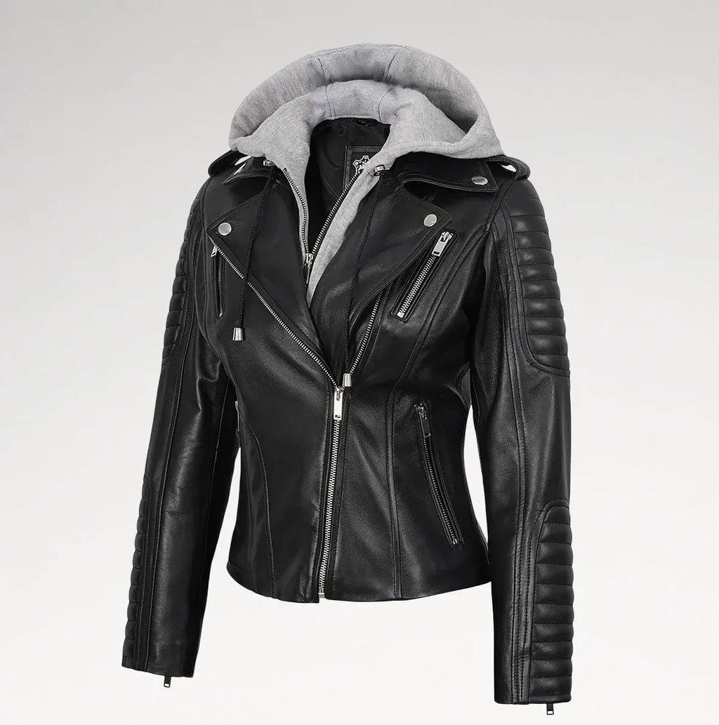 A black faux-leather moto jacket with a gray sherpa-lined hood, featuring quilted sleeve panels and silver zippers, shown on a light gray background.