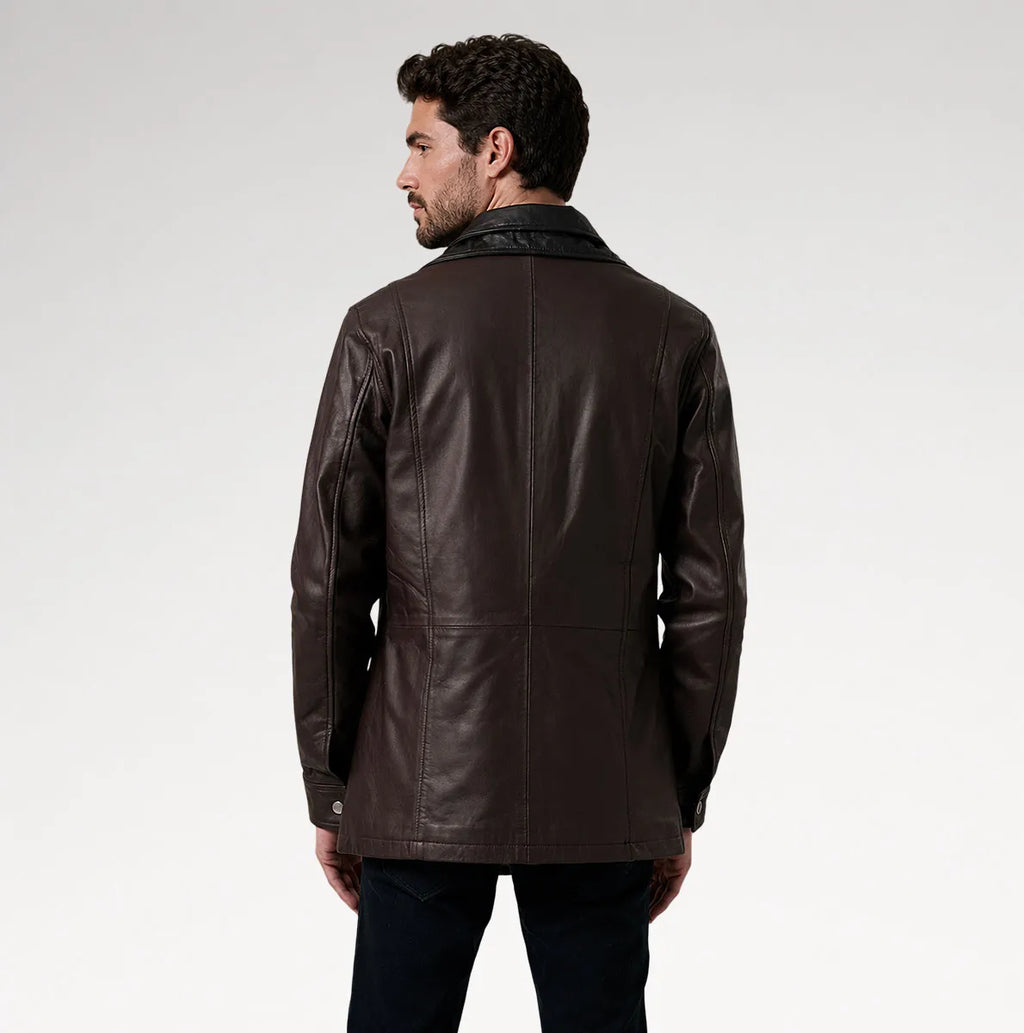 A man wearing a dark brown leather jacket, shown from the back against a light gray studio background.